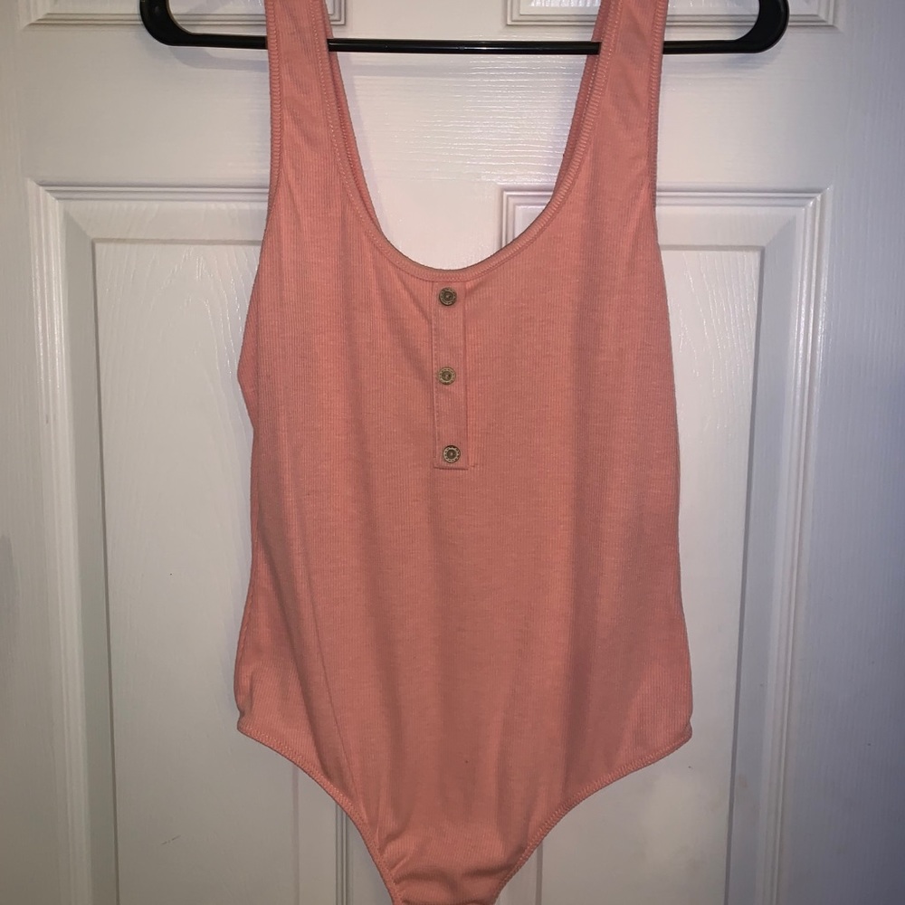 Body suit, very fitted on medium to larges